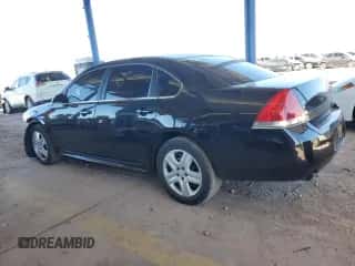 2015 Chevrolet Impala Police Police with VIN 2G1WD5E37F1104232, listed as a Copart auction lot 73033484 with 126,578 mi miles and Salvage title. Bid and sale history available at DreamBid. Image 2.