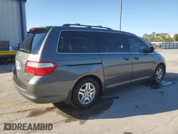 2007 Honda Odyssey EX-L с VIN 5FNRL38787B097039, выставлен на аукционе Copart как лот 86219175 с пробегом 80 881 миль миль и Списание • Salvage title. История ставок и продаж доступна на DreamBid. Изображение 3.