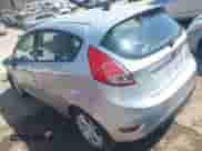 2014 Ford Fiesta S with VIN 3FADP4TJ5EM199405, listed as a IAAI auction lot 41915494 with 127,474 mi miles and . Bid and sale history available at DreamBid. Image 3.