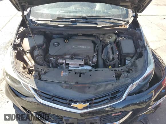 2016 Chevrolet Cruze Premier z VIN 1G1BG5SM5G7272460, wystawiony jako Copart lot #71534645 z przebiegiem 107 635 mil mil oraz Szkoda całkowita • Salvage title. Historia ofert i sprzedaży dostępna na DreamBid. Obrazek 11.
