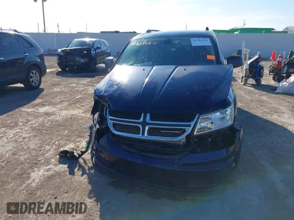 2019 Dodge Journey SE Value with VIN 3C4PDCAB6KT868319, listed as a IAAI auction lot 41286628 with 63,265 mi miles and . Bid and sale history available at DreamBid. Image 12.