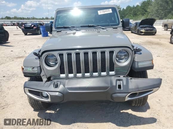 2021 Jeep Wrangler Unlimited Sahara with VIN 1C4HJXEN6MW590284, listed as a Copart auction lot 61804035 with 74,789 mi miles and Salvage title. Bid and sale history available at DreamBid. Image 5.