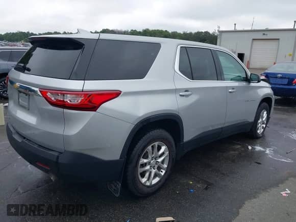 2021 Chevrolet Traverse LS with VIN 1GNEVFKWXMJ119788, listed as a IAAI auction lot 42706517 with 58,471 mi miles and . Bid and sale history available at DreamBid. Image 4.