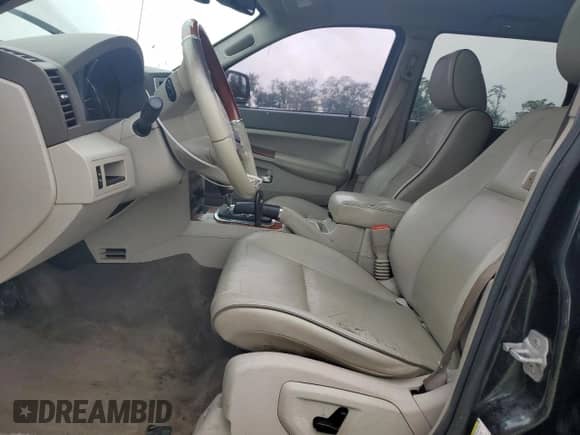 2008 Jeep Grand Cherokee Overland with VIN 1J8HR68268C212681, listed as a Copart auction lot 81781025 with 220,624 mi miles and Salvage title. Bid and sale history available at DreamBid. Image 7.