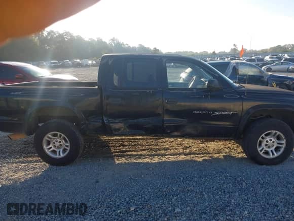 2001 Dodge Dakota Sport with VIN 1B7HG2ANX1S299183, listed as a IAAI auction lot 43302069 with 197,647 mi miles and . Bid and sale history available at DreamBid. Image 13.