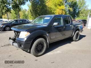2007 Nissan Frontier LE with VIN 1N6AD07W37C447043, listed as a Copart auction lot 75016144 with 169,901 mi miles and Salvage title. Bid and sale history available at DreamBid. Image 1.