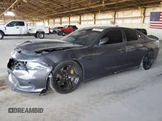 2018 Dodge Charger Daytona 392 with VIN 2C3CDXGJXJH120947, listed as a Copart auction lot 80142075 with 103,888 mi miles and Salvage title. Bid and sale history available at DreamBid. Image 1.