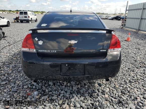 2014 Chevrolet Impala LTZ с VIN 2G1WC5E38E1107206, выставлен на аукционе Copart как лот 60467655 с пробегом 140 636 миль миль и Списание • Salvage title. История ставок и продаж доступна на DreamBid. Изображение 6.