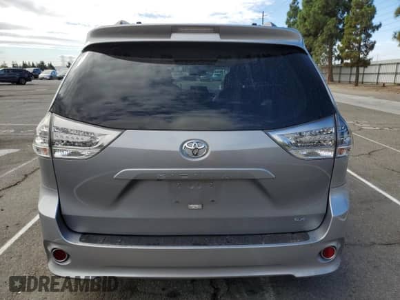 2014 Toyota Sienna SE with VIN 5TDXK3DC2ES465091, listed as a Copart auction lot 80740415 with 122,588 mi miles and Salvage title. Bid and sale history available at DreamBid. Image 6.