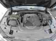 2018 BMW 7 Series 740i z VIN WBA7E2C56JG741603, wystawiony jako Copart lot #51940605 z przebiegiem Nie podano mil oraz Szkoda całkowita • Salvage title. Historia ofert i sprzedaży dostępna na DreamBid. Obrazek 12.