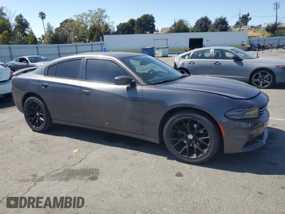 2015 Dodge Charger SE z VIN 2C3CDXBG3FH761828, wystawiony jako Copart lot #71093075 z przebiegiem 126 192 mil mil oraz Szkoda całkowita • Salvage title. Historia ofert i sprzedaży dostępna na DreamBid. Obrazek 4.