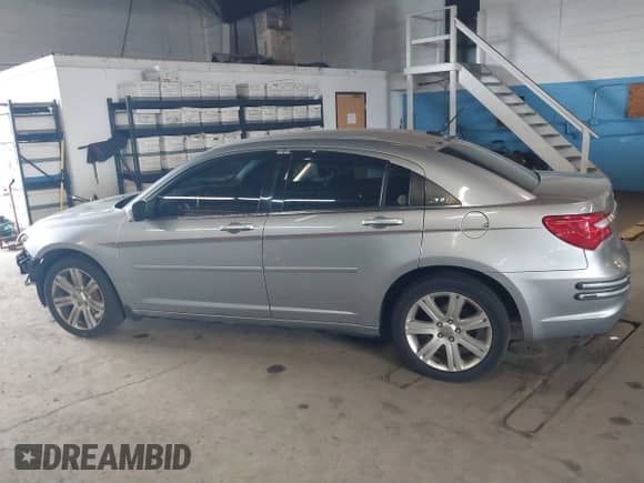 2014 Chrysler 200 Touring with VIN 1C3CCBBBXEN107554, listed as a IAAI auction lot 43045043 with 94,235 mi miles and . Bid and sale history available at DreamBid. Image 14.