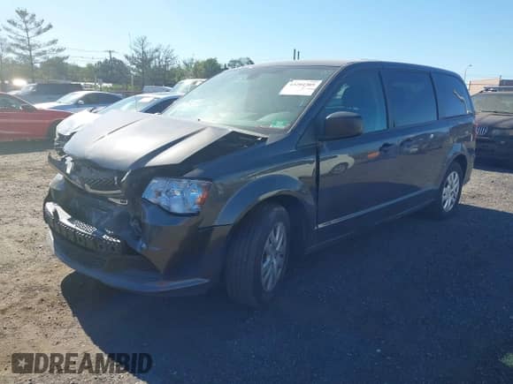 2019 Dodge Grand Caravan SE with VIN 2C4RDGBGXKR770407, listed as a IAAI auction lot 43284705 with 84,321 mi miles and . Bid and sale history available at DreamBid. Image 17.