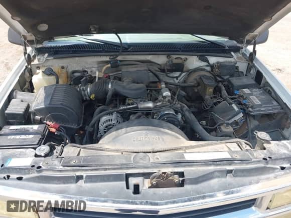 1999 Chevrolet Suburban z VIN 1GNEC16R2XJ362108, wystawiony jako IAAI lot #42973441 z przebiegiem 308 292 mil mil oraz . Historia ofert i sprzedaży dostępna na DreamBid. Obrazek 10.