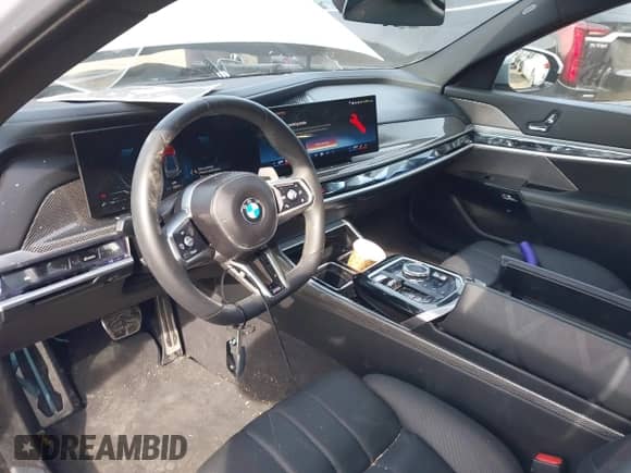 2023 BMW 7 Series 760i xDrive with VIN WBA33EJ06PCL84520, listed as a IAAI auction lot 41556566 with 20,617 mi miles and . Bid and sale history available at DreamBid. Image 5.