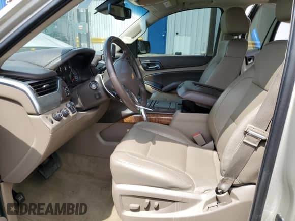 2015 Chevrolet Tahoe LTZ с VIN 1GNSKCKC9FR111797, выставлен на аукционе Copart как лот 67271155 с пробегом 183 695 миль миль и Списание • Salvage title. История ставок и продаж доступна на DreamBid. Изображение 7.