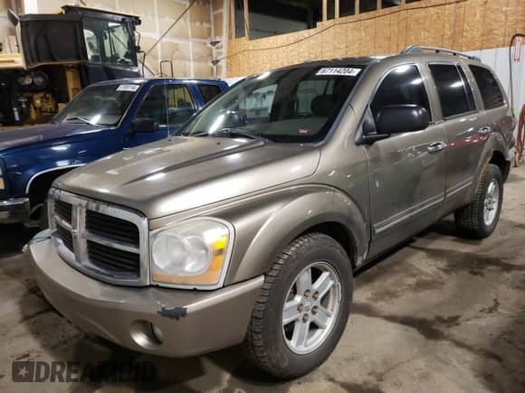 2006 Dodge Durango Limited with VIN 1D4HB58266F122998, listed as a Copart auction lot 67114204 with 236,811 mi miles and Salvage title. Bid and sale history available at DreamBid. Image 1.