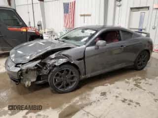 2007 Hyundai Tiburon GT с VIN KMHHN66F07U234849, выставлен на аукционе Copart как лот 82695934 с пробегом Не указан миль и На запчасти • Non repairable. История ставок и продаж доступна на DreamBid. Изображение 1.