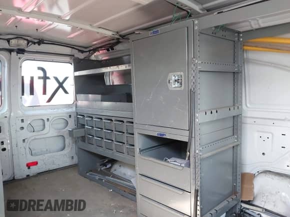 2010 Ford Econoline Cargo Commercial with VIN 1FTNE2EL1ADA10309, listed as a IAAI auction lot 41833946 with 136,578 mi miles and . Bid and sale history available at DreamBid. Image 14.