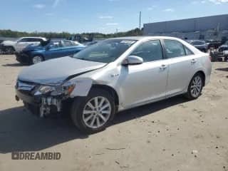 2012 Toyota Camry XLE with VIN 4T1BD1FKXCU039764, listed as a Copart auction lot 85346035 with 124,073 mi miles and Salvage title. Bid and sale history available at DreamBid. Image 1.