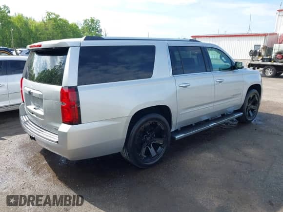 2018 Chevrolet Suburban Premier z VIN 1GNSKJKC8JR382279, wystawiony jako IAAI lot #42129937 z przebiegiem 107 799 mil mil oraz . Historia ofert i sprzedaży dostępna na DreamBid. Obrazek 4.