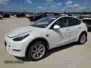 2024 Tesla Model Y with VIN 7SAYGDEDXRF044347, listed as a Copart auction lot 65477684 with 5,865 mi miles and Salvage title. Bid and sale history available at DreamBid. Image 1.