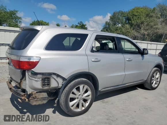 2012 Dodge Durango SXT with VIN 1C4RDHAG5CC321718, listed as a Copart auction lot 68470685 with 117,403 mi miles and Salvage title. Bid and sale history available at DreamBid. Image 3.