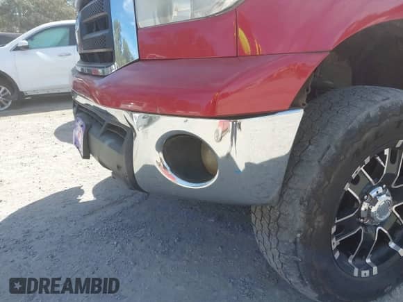 2013 Toyota Tundra z VIN 5TFUM5F16DX041474, wystawiony jako IAAI lot #43363211 z przebiegiem 258 170 mil mil oraz . Historia ofert i sprzedaży dostępna na DreamBid. Obrazek 6.