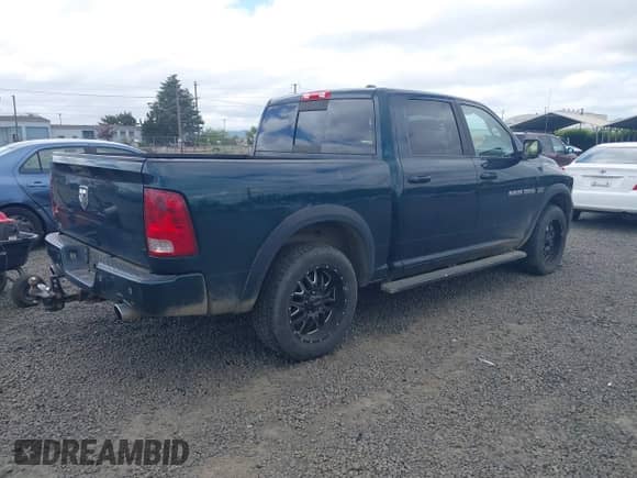 2011 Ram 1500 SLT with VIN 1D7RV1CT0BS529367, listed as a IAAI auction lot 42298304 with 124,393 mi miles and . Bid and sale history available at DreamBid. Image 4.