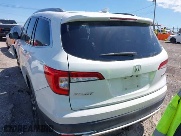 2020 Honda Pilot Touring 7-Passenger z VIN 5FNYF5H69LB000835, wystawiony jako IAAI lot #42318516 z przebiegiem 122 572 mil mil oraz . Historia ofert i sprzedaży dostępna na DreamBid. Obrazek 16.
