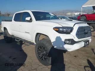 2019 Toyota Tacoma SR5 with VIN 3TMDZ5BNXKM060039, listed as a IAAI auction lot 43541474 with 47,392 mi miles and . Bid and sale history available at DreamBid. Image 1.