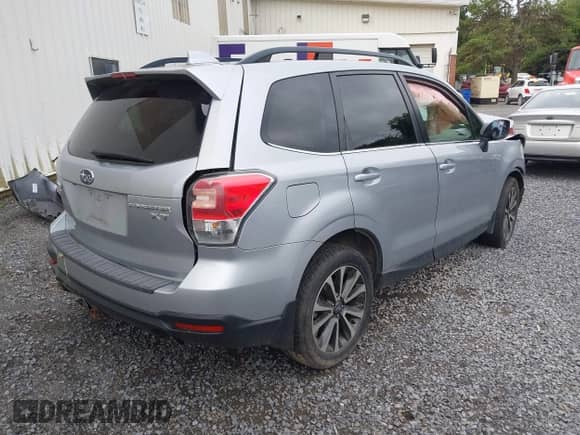 2018 Subaru Forester Premium with VIN JF2SJGEC8JH449707, listed as a IAAI auction lot 42646139 with 103,000 mi miles and . Bid and sale history available at DreamBid. Image 4.