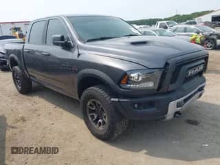 2017 Ram 1500 Rebel z VIN 1C6RR7YT6HS861839, wystawiony jako IAAI lot #42407025 z przebiegiem 127 084 mil mil oraz . Historia ofert i sprzedaży dostępna na DreamBid. Obrazek 1.