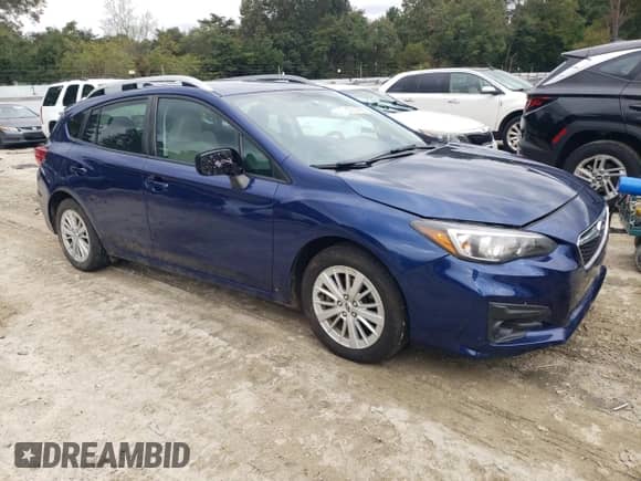 2017 Subaru Impreza Premium with VIN 4S3GTAB61H3753110, listed as a Copart auction lot 85914785 with 94,718 mi miles and Salvage title. Bid and sale history available at DreamBid. Image 4.