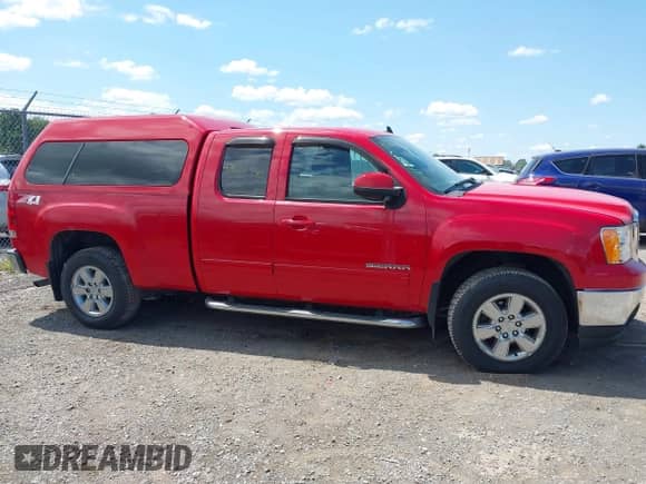 2011 GMC Sierra 1500 SLT with VIN 1GTR2WE36BZ321434, listed as a IAAI auction lot 42866440 with 107,339 mi miles and . Bid and sale history available at DreamBid. Image 13.