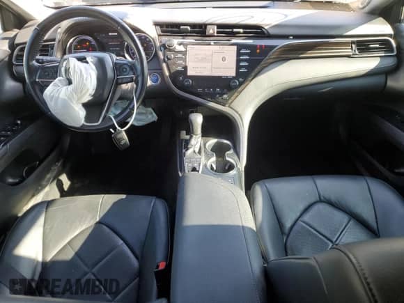 2019 Toyota Camry Hybrid LE z VIN 4T1B21HK7KU515521, wystawiony jako Copart lot #70407265 z przebiegiem 200 945 mil mil oraz Szkoda całkowita • Salvage title. Historia ofert i sprzedaży dostępna na DreamBid. Obrazek 8.