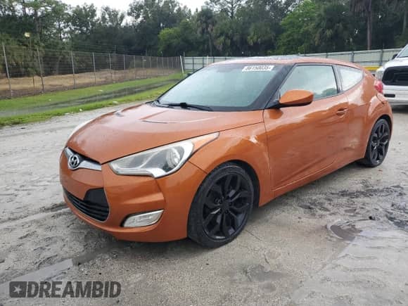 2012 Hyundai Veloster w/Gray Int z VIN KMHTC6AD9CU029014, wystawiony jako Copart lot #86150035 z przebiegiem 112 162 mil mil oraz Szkoda całkowita • Salvage title. Historia ofert i sprzedaży dostępna na DreamBid. Obrazek 1.