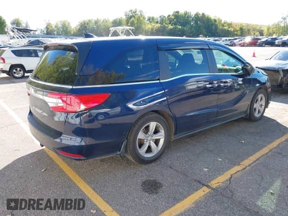 2019 Honda Odyssey EX-L with VIN 5FNRL6H76KB054460, listed as a IAAI auction lot 43404528 with 96,987 mi miles and . Bid and sale history available at DreamBid. Image 4.