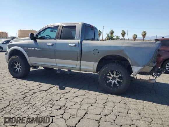2012 Ram 1500 Laramie with VIN 1C6RD7JT9CS327557, listed as a Copart auction lot 66227085 with 203,830 mi miles and Salvage title. Bid and sale history available at DreamBid. Image 2.