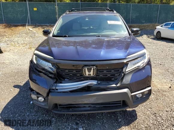2021 Honda Passport Touring with VIN 5FNYF8H92MB042258, listed as a Copart auction lot 68150945 with 60,684 mi miles and Salvage title. Bid and sale history available at DreamBid. Image 5.