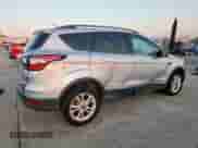 2018 Ford Escape SE with VIN 1FMCU9GD0JUB93710, listed as a Copart auction lot 85751065 with 138,902 mi miles and Salvage title. Bid and sale history available at DreamBid. Image 3.