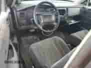 2003 Dodge Dakota с VIN 1D7FL36X03S159557, выставлен на аукционе Copart как лот 85516535 с пробегом 209 972 миль миль и Списание • Salvage title. История ставок и продаж доступна на DreamBid. Изображение 8.
