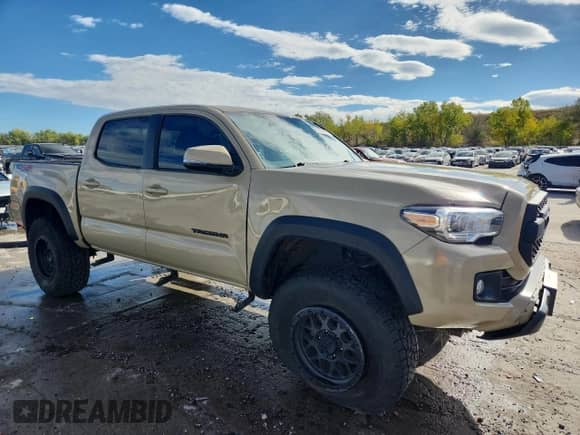 2017 Toyota Tacoma SR5 with VIN 3TMCZ5AN4HM095519, listed as a Copart auction lot 85329645 with 86,496 mi miles and Salvage title. Bid and sale history available at DreamBid. Image 4.