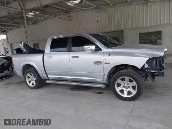 2015 Ram 1500 Laramie Limited with VIN 1C6RR7PT1FS788507, listed as a IAAI auction lot 42400146 with 129,572 mi miles and . Bid and sale history available at DreamBid. Image 14.