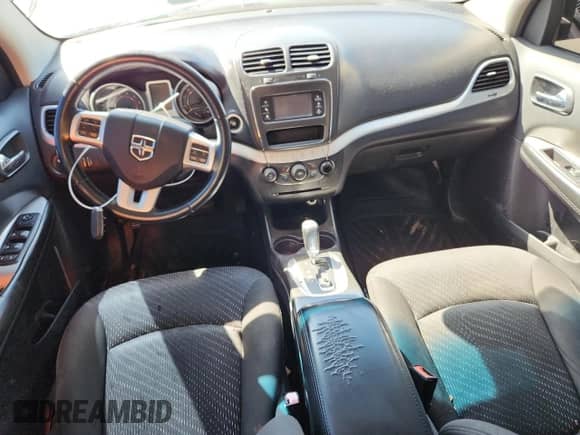 2015 Dodge Journey American Value с VIN 3C4PDCAB1FT735635, выставлен на аукционе Copart как лот 87420745 с пробегом 185 057 миль миль и Списание • Salvage title. История ставок и продаж доступна на DreamBid. Изображение 8.