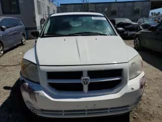 2007 Dodge Caliber z VIN 1B3HB28B47D258301, wystawiony jako Copart lot #69850435 z przebiegiem 216 387 mil mil oraz Czysty tytuł • Clean title. Historia ofert i sprzedaży dostępna na DreamBid. Obrazek 5.