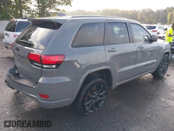 2020 Jeep Grand Cherokee Laredo E with VIN 1C4RJFAG9LC313781, listed as a IAAI auction lot 43205694 with 67,222 mi miles and . Bid and sale history available at DreamBid. Image 4.