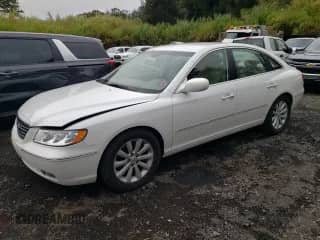 2010 Hyundai Azera GLS с VIN KMHFC4DD4AA513796, выставлен на аукционе Copart как лот 59782965 с пробегом 56 958 миль миль и Списание • Salvage title. История ставок и продаж доступна на DreamBid. Изображение 1.