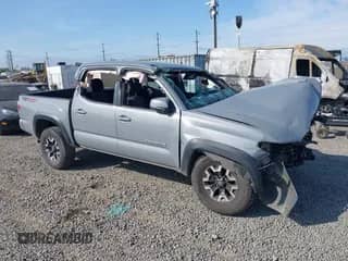 2021 Toyota Tacoma SR with VIN 3TMCZ5AN0MM373858, listed as a IAAI auction lot 42506451 with Not provided miles and . Bid and sale history available at DreamBid. Image 1.