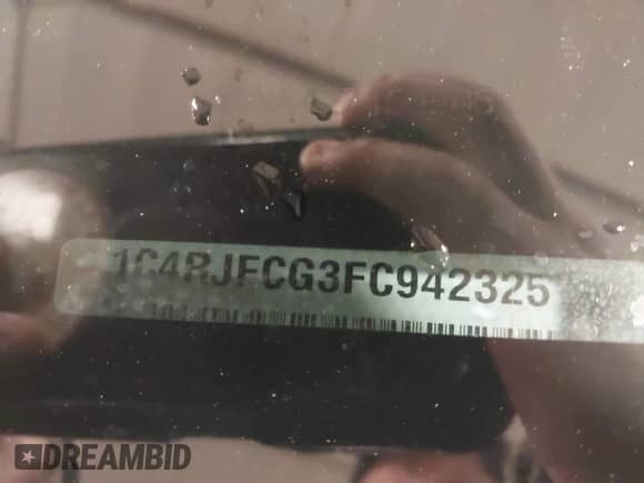 2015 Jeep Grand Cherokee Overland with VIN 1C4RJFCG3FC942325, listed as a IAAI auction lot 43140141 with 105,099 mi miles and . Bid and sale history available at DreamBid. Image 9.